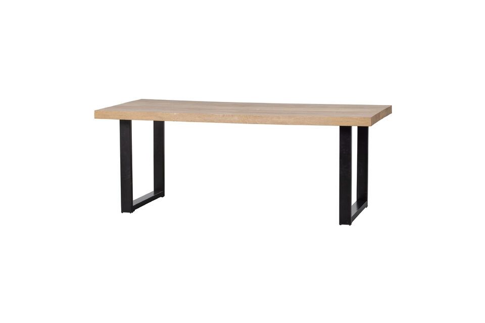 Cette table à manger Tablo en bois de manguier est un mélange parfait de robustesse et de style