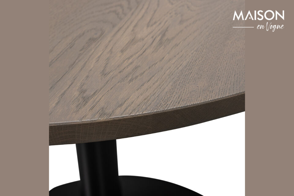 Le plateau de la table est doté d\'une finition subtile aux bords arrondis