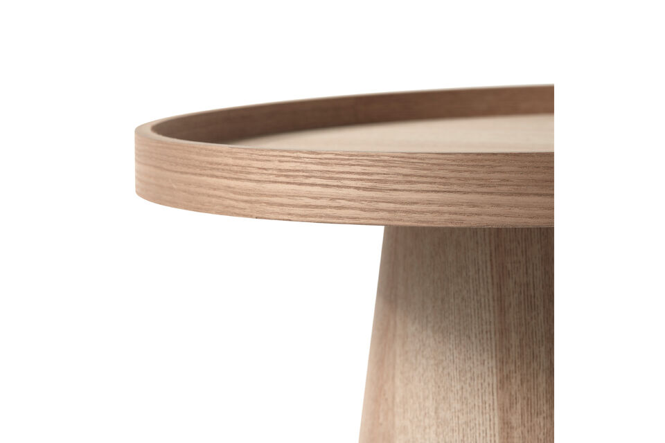 L\'utilisation de bois MDF laqué garantit que la table rayonne de calme et s\'intègre facilement
