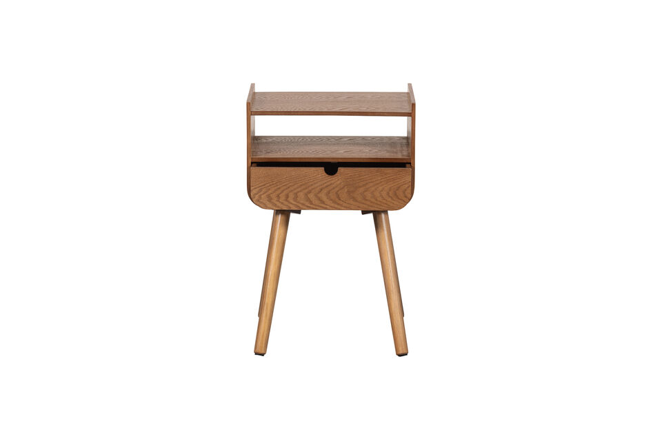 L\'utilisation de bois MDF laqué confère à cette table de chevet une atmosphère apaisante et