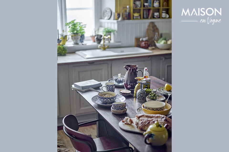 La Table de salle à manger Milow de la Creative Collection en bois de manguier foncé ajoute une