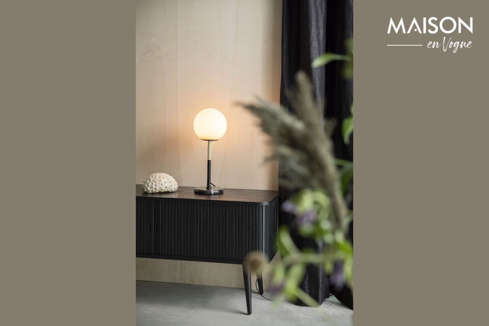 This sophisticated lamp is designed to enhance your home décor with its exquisite materials and