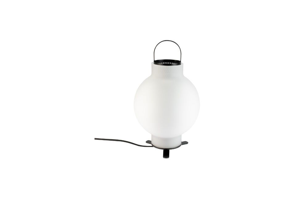 The Nomad lamp is not just a lighting object; it\'s also a refined decorative element