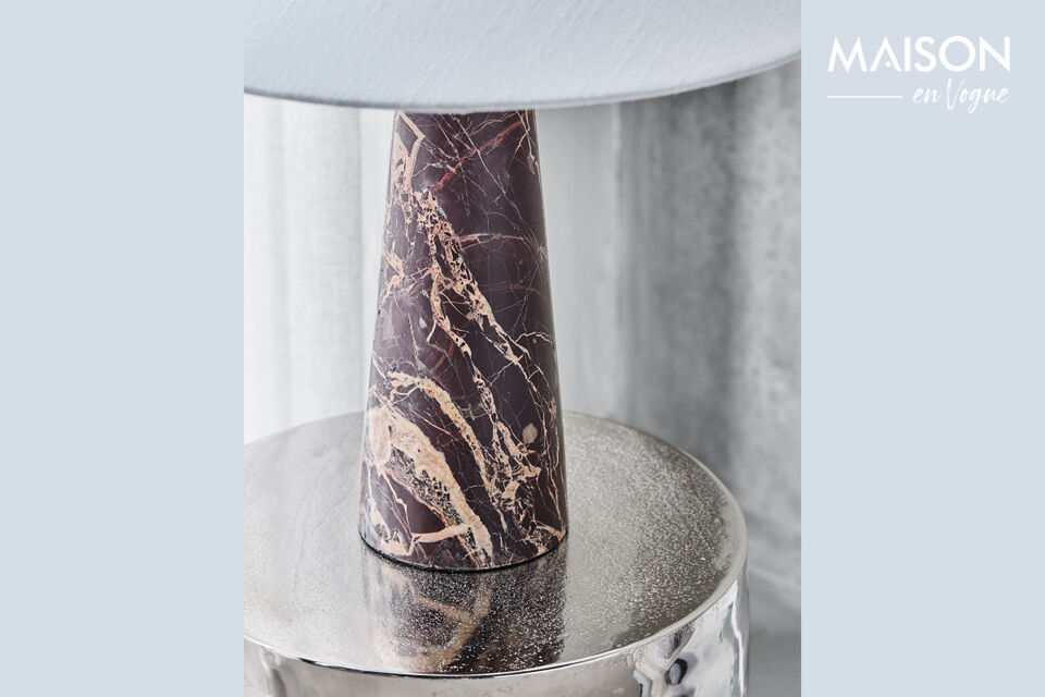 The HDSoffi table lamp features a unique and solid marble base in warm brown tones paired with an