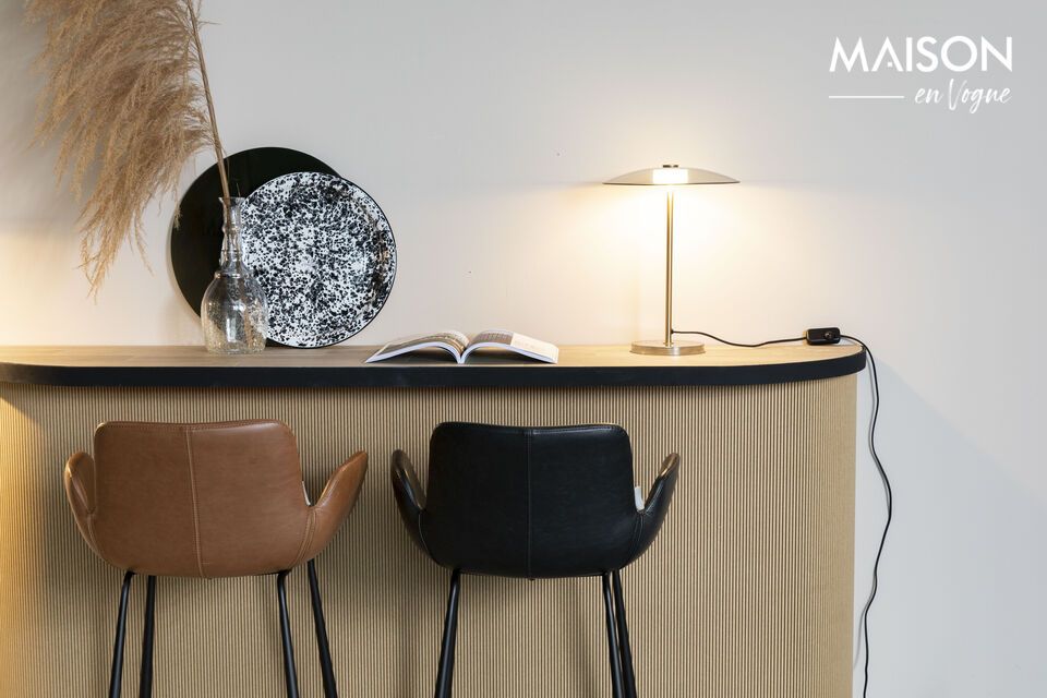 The Float golden glass table lamp is designed for versatility