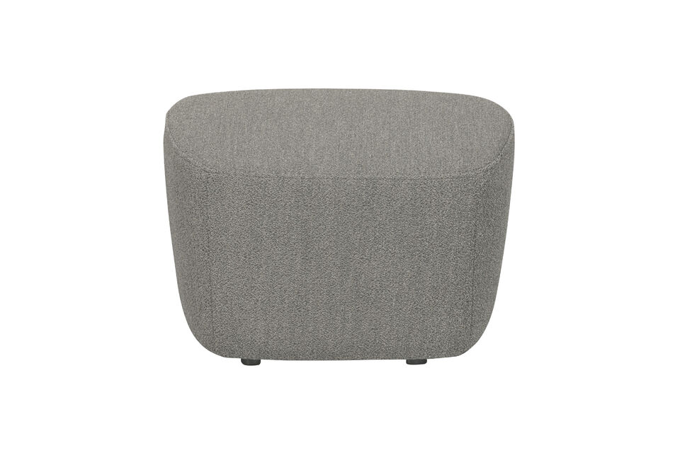 Les formes rondes et la texture laineuse du tissu bouclé créent une atmosphère chaleureuse et