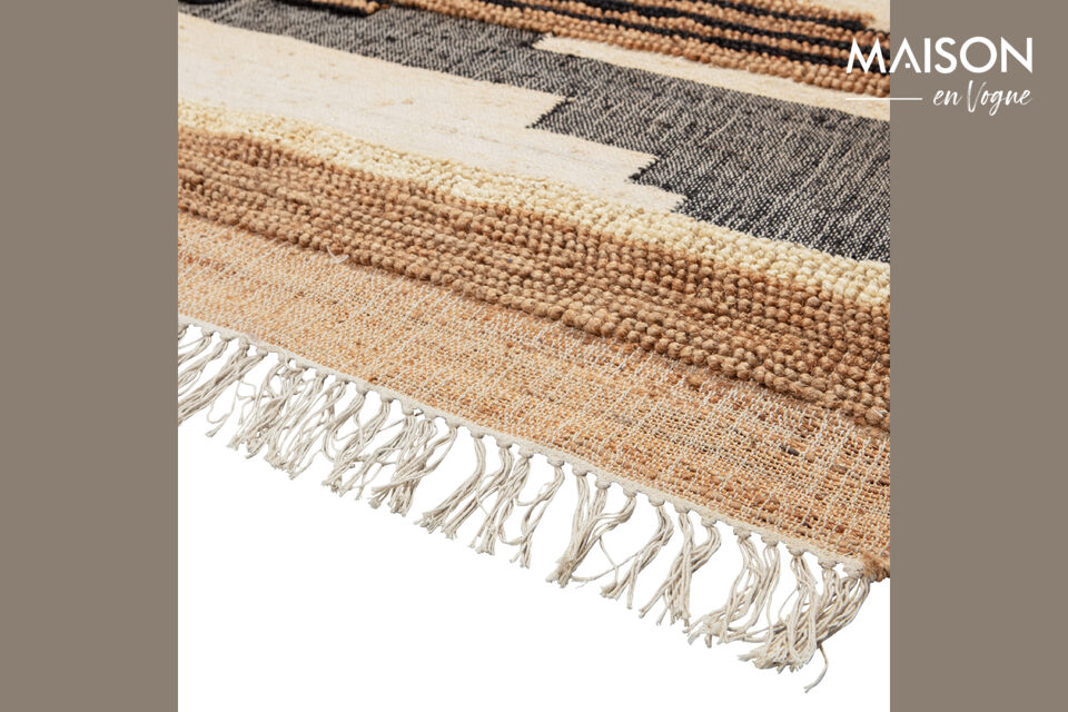 Le tapis provient de la collection de la marque néerlandaise de décoration d\'intérieur WOOOD et