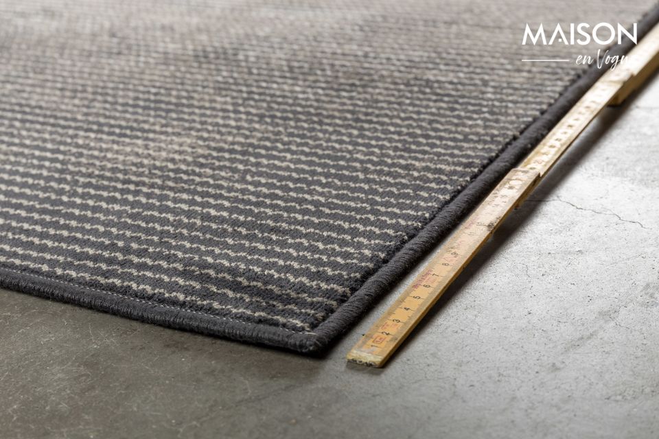 Le tapis Obi 170 X 240 gris ne révèle pas tous ses secrets au premier coup d\'il