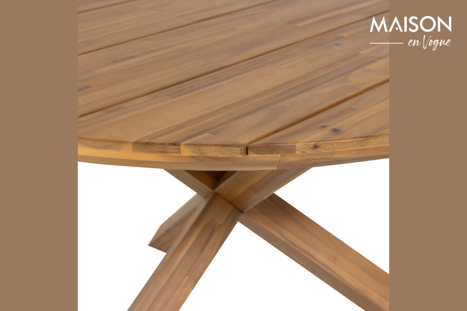 Le design ludique &agrave; trois pieds conf&egrave;re &agrave; cette table de jardin ronde un