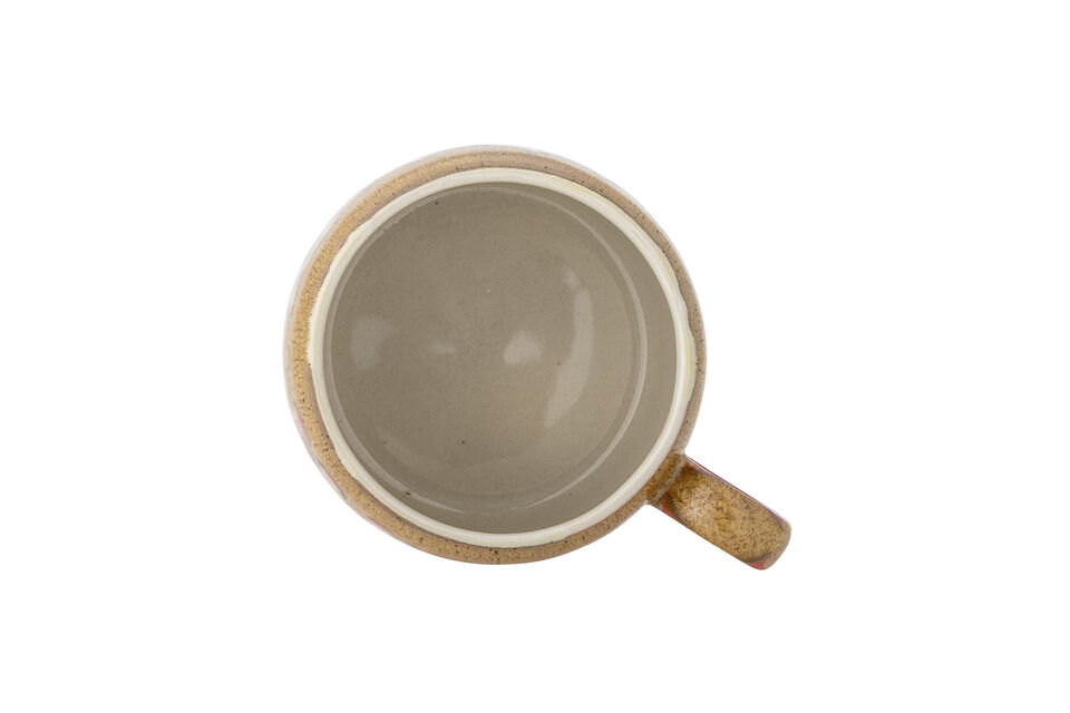 El vidriado desciende de forma natural por la taza, creando un aspecto vibrante