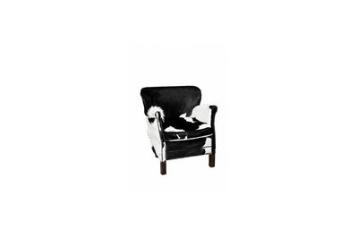 Turner zwarte koeienhuid fauteuil