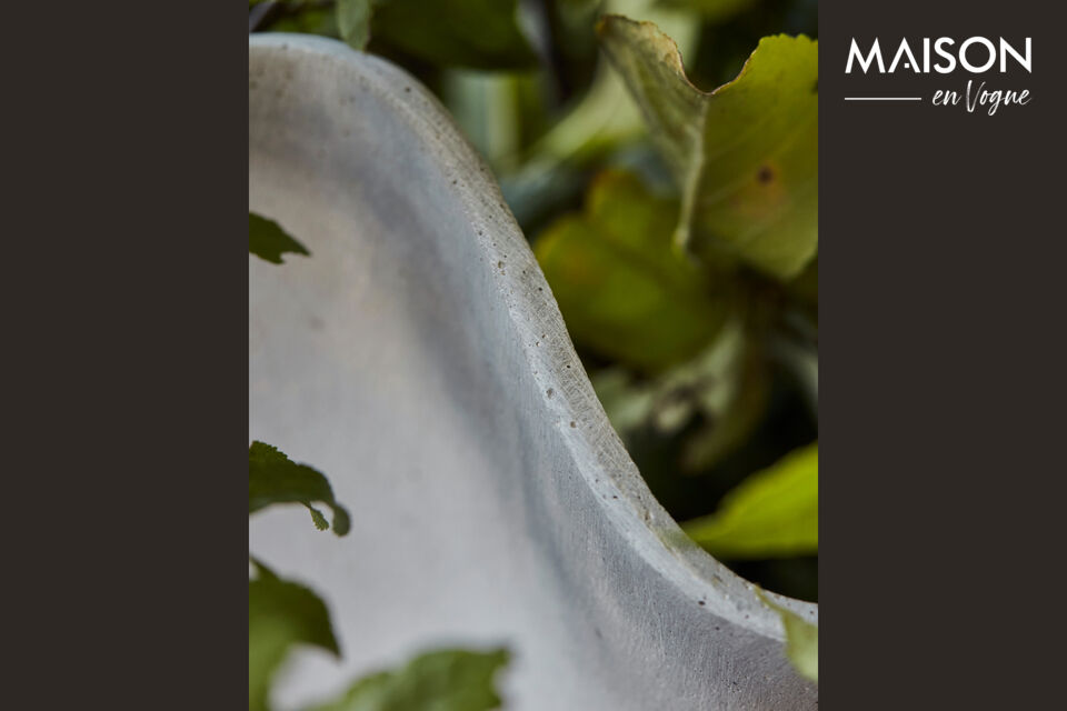 Add a touch of elegance to your home décor with this grey polyresin planter