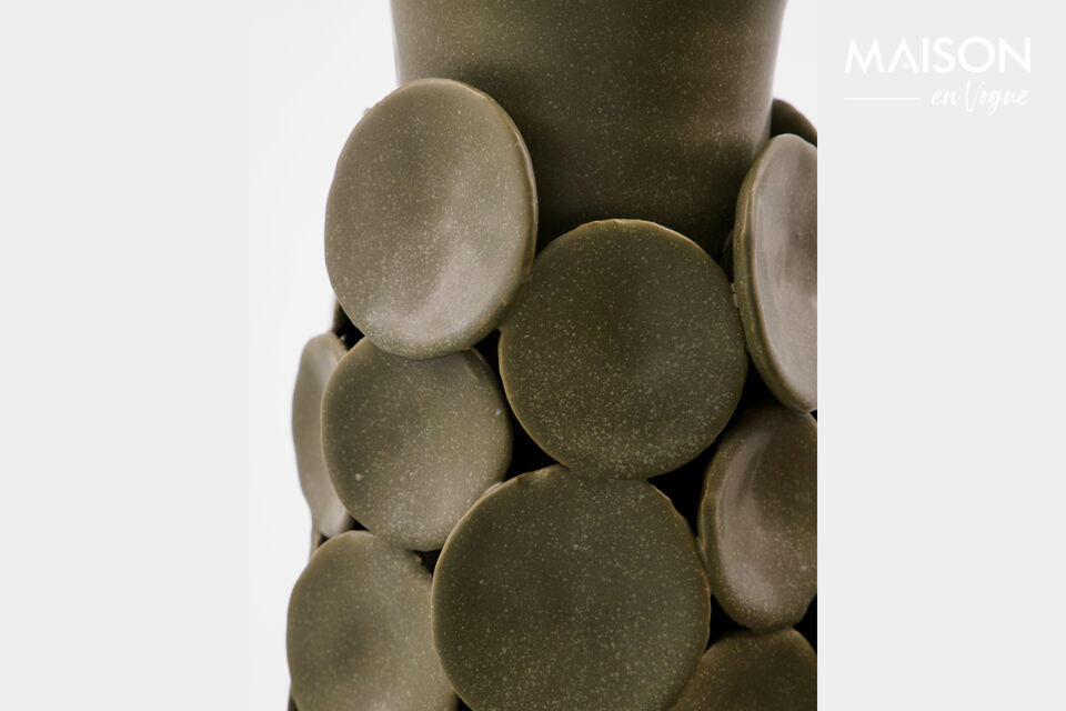 This khaki stoneware vase features handcrafted decorative circles that transform it into a