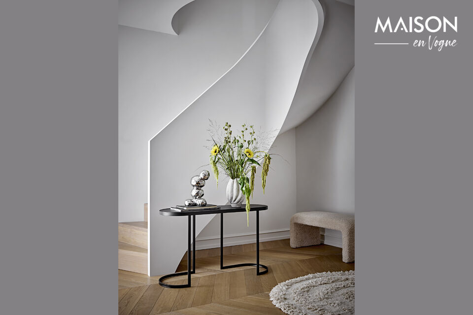 The Cove Vase by Bloomingville is an elegant stoneware vase with a textured surface and an off-white