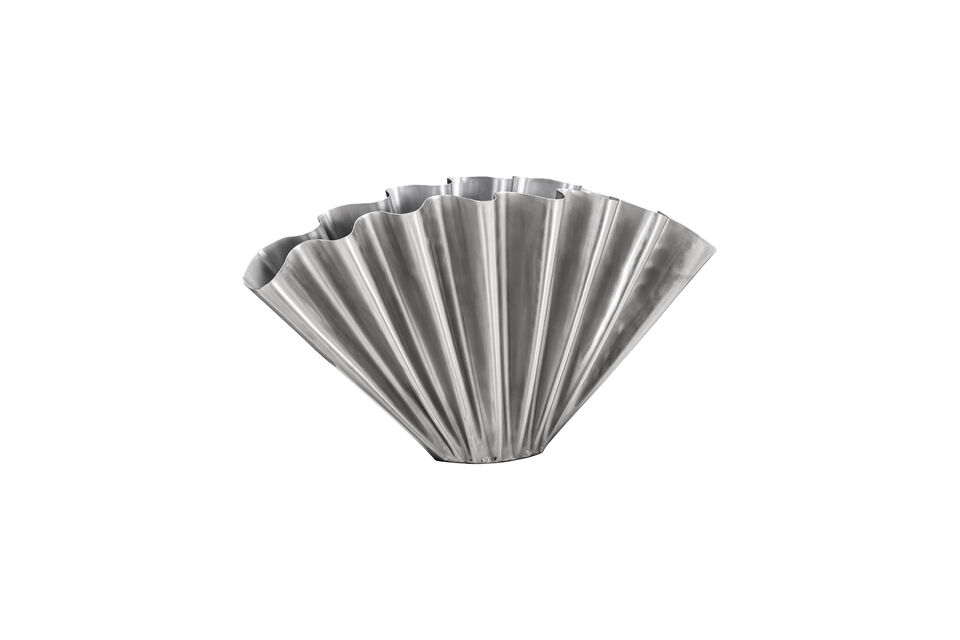 This vase grabs your attention with its brushed silver finish and sculptural folds