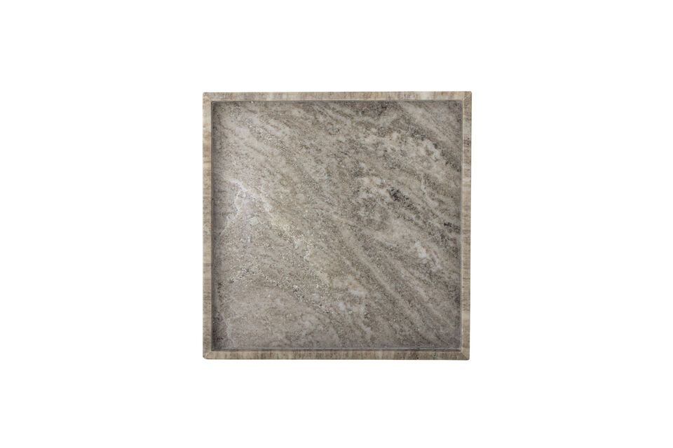 Il design sobrio e il colore caldo del marmo marrone si sposano armoniosamente con una varietà di