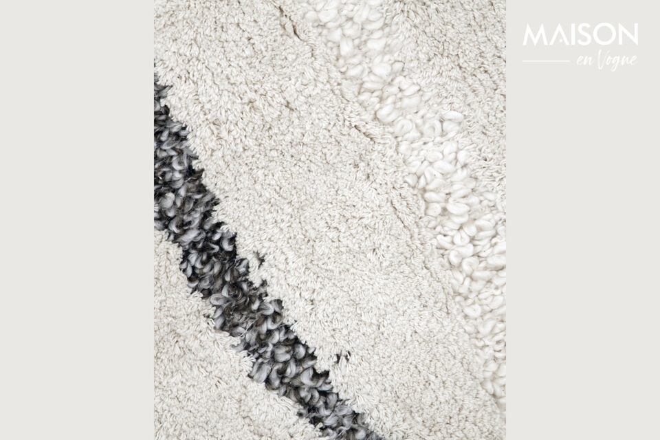 Elevate your living space with this handmade rug, adding warmth and texture to any room