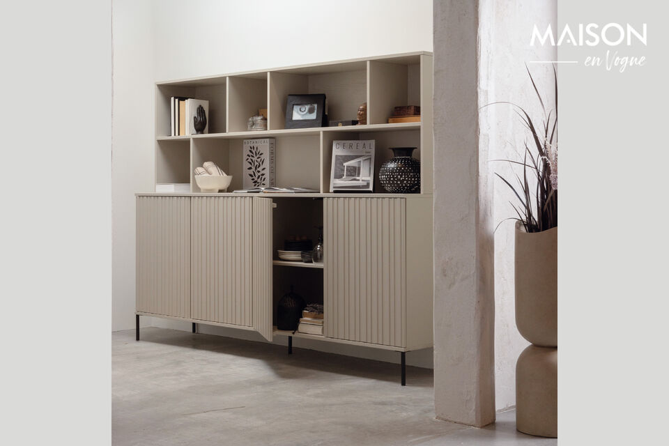 Generous wall cabinet Made of pine with a dust colored lacquer A display place for your most